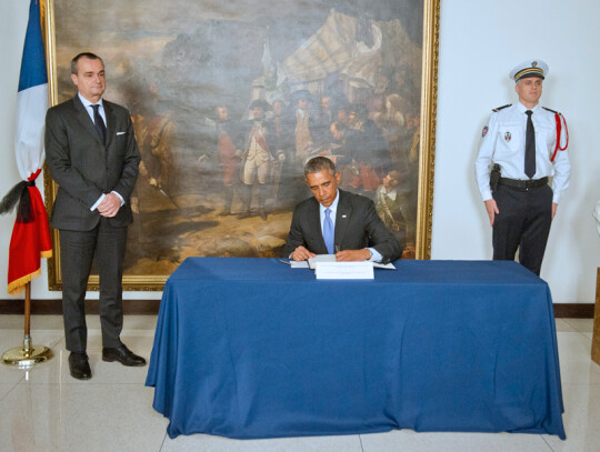 Obama Signs Condolence Book at the Embassy of France