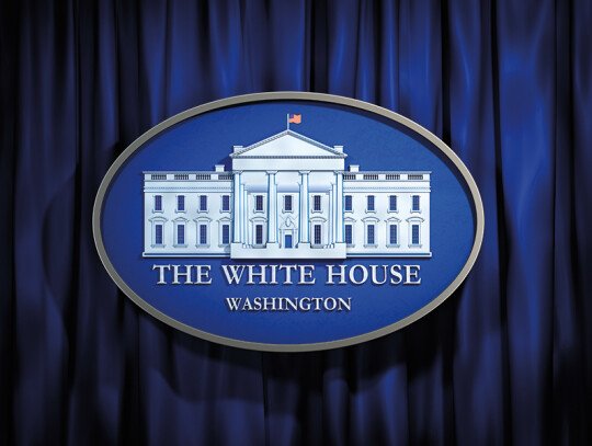 The White House Washington sign on blue background