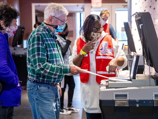 Washington DC residents line up to cast their ballots for the 2020 presidential election at the Nationals Park Super Vote Center, USA - 27 Oct 2020