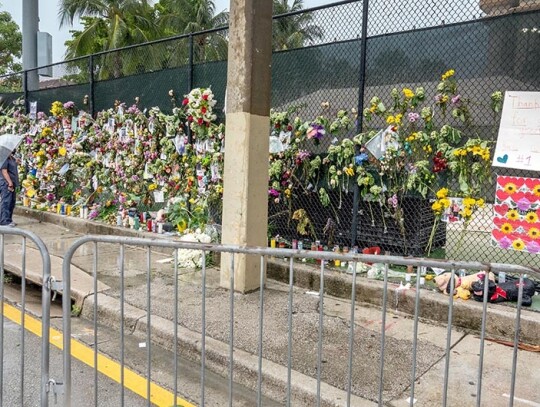 Makeshift memorial near the site of the partially collapsed tower in Surfside, Florida, USA - 30 Jun 2021