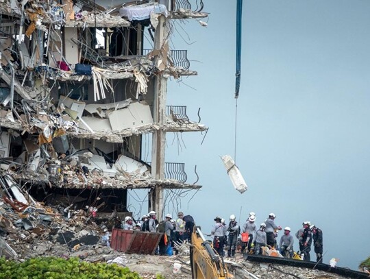 Rescue team search the partially collapsed Champlain Towers South condominium building, Surfside, USA - 30 Jun 2021