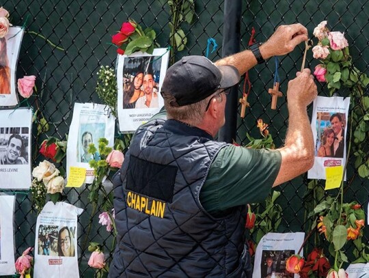 Missing persons memorial near the partially collapsed condominium in Surfside, USA - 26 Jun 2021