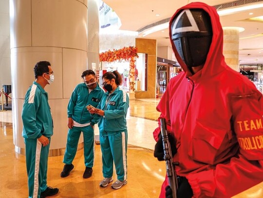 Shopping mall employees wear Squid Game costumes in Jakarta, Indonesia - 20 Oct 2021