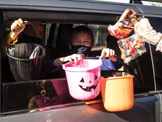 Halloween drive-thru trick-or-treat event during the coronavirus pandemic in Monterey Park, USA - 29 Oct 2020