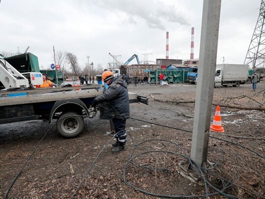 Workers restore energy infrastructure following Russian missile strikes in Ukraine, Kyiv - 26 Jan 2023