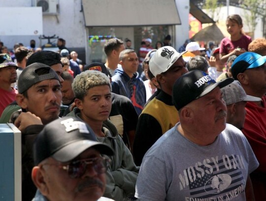 Migrants gather at US-Mexico border crossing, Ciudad Juarez - 10 Apr 2023