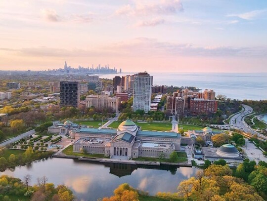 Mesmerizing aerial view of the sunset sky over May at Hyde Park, Chicago