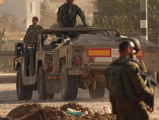 Israeli military car carrying Palestinians prisoners believed to be Hamas militants, Unknown, Israel - 21 Nov 2023