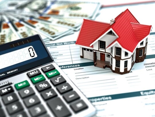 Mortgage calculator. House, noney and document.