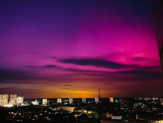 Aurora above the glow of a battle in the Kharkiv area, Ukraine - 10 May 2024