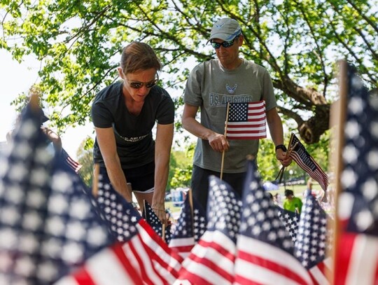 Volunteers plant flags for Memorial Day Flag Garden on Boston Common, USA - 22 May 2024