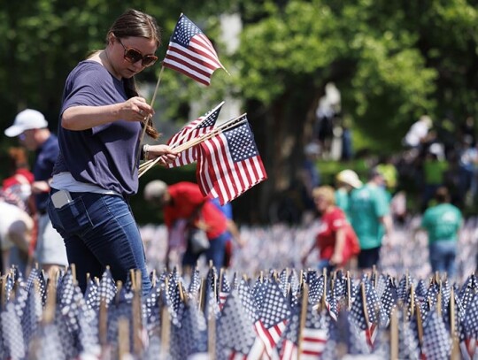 Volunteers plant flags for Memorial Day Flag Garden on Boston Common, USA - 22 May 2024